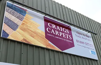 Craigs carpets sign outside discount warehouse
